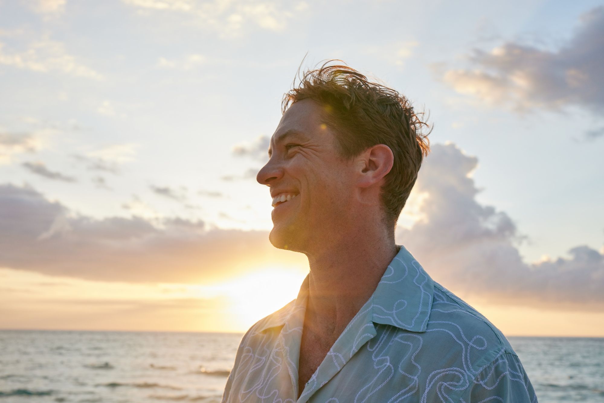 Caribbean-Lifestyle-Man-Smiling-Sunset-1