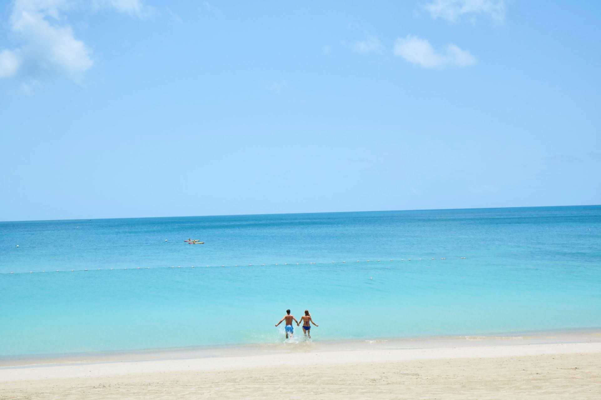 SAT-Lifestyle-Couple-Running-into-Ocean-1